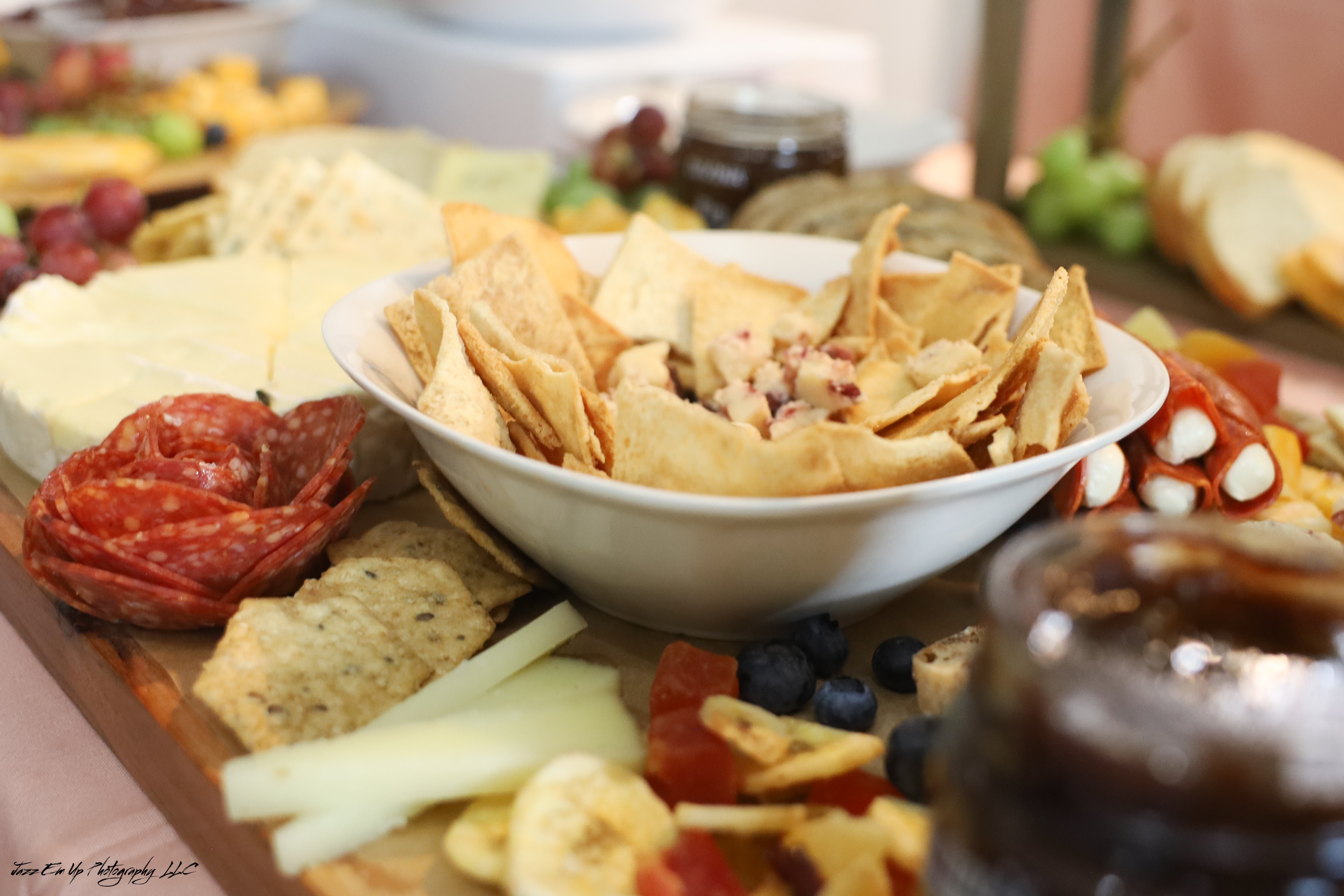 Charcuterie board with cheese, fruit, meats, and vegetables in Wilmington NC
